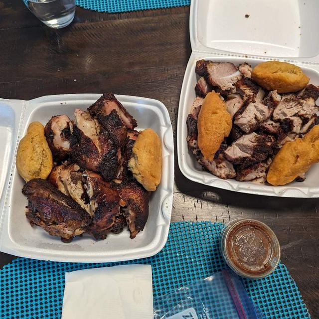 Two takeaway boxes with fritters